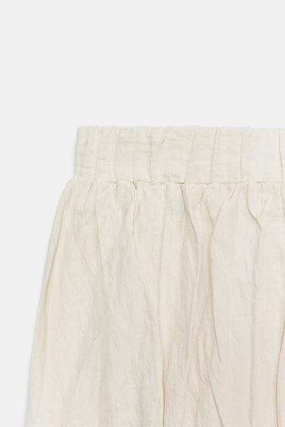 Jupe midi en maille effet froissé