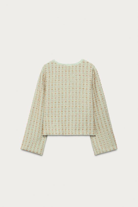 Veste en maille à perles Marisa Berenson x Zara