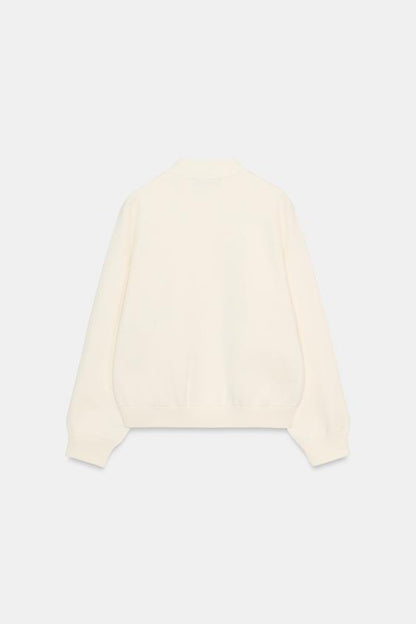 Veste en maille à bouton contrasté
