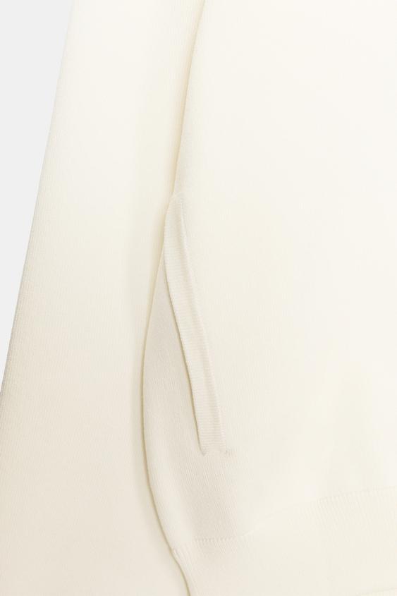Veste en maille à bouton contrasté