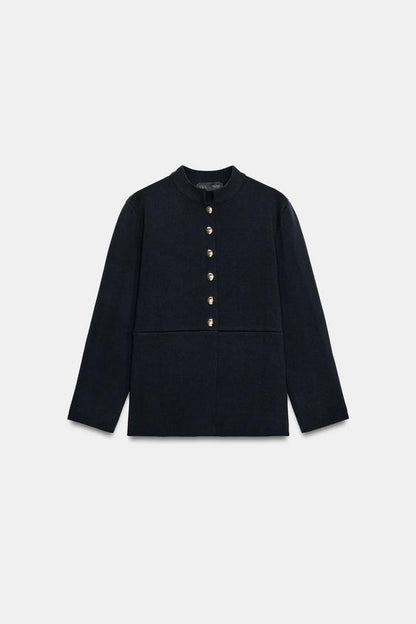 Veste en maille peplum à bouton doré