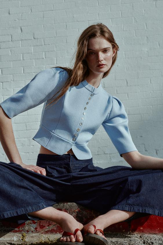 Veste en maille à manches bouffantes