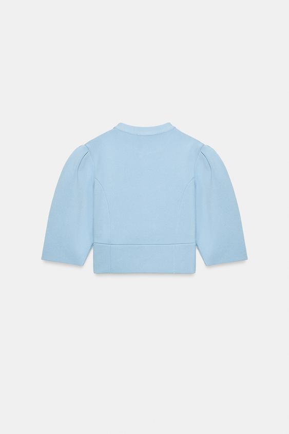Veste en maille à manches bouffantes