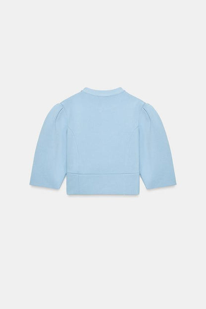 Veste en maille à manches bouffantes