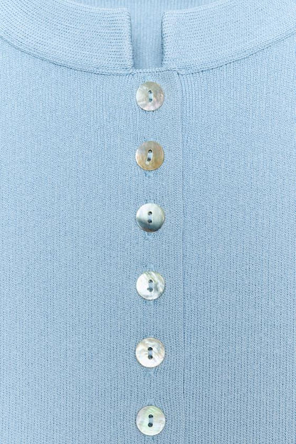Veste en maille à manches bouffantes