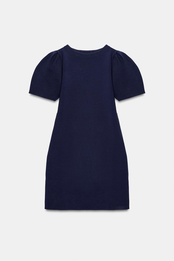 Robe courte en maille à manches bouffantes