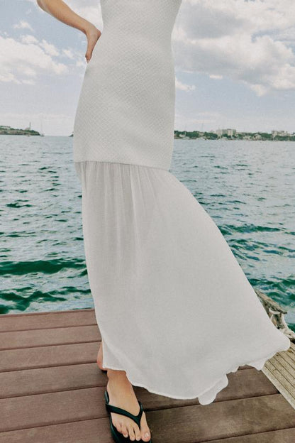 Robe dos-nu en maille contrastée