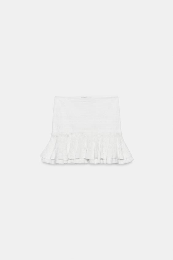 Jupe mini en maille à volants