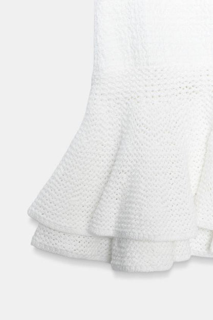 Jupe mini en maille à volants