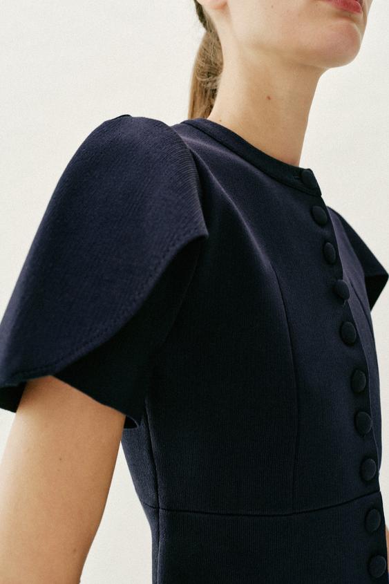Veste en maille à manches bouffantes à fentes