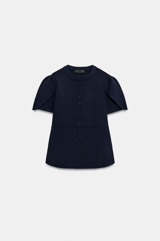 Veste en maille à manches bouffantes à fentes