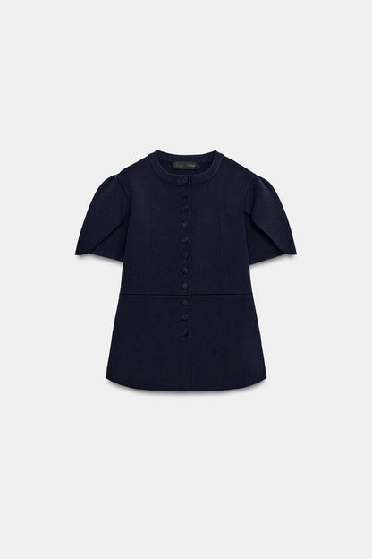Veste en maille à manches bouffantes à fentes