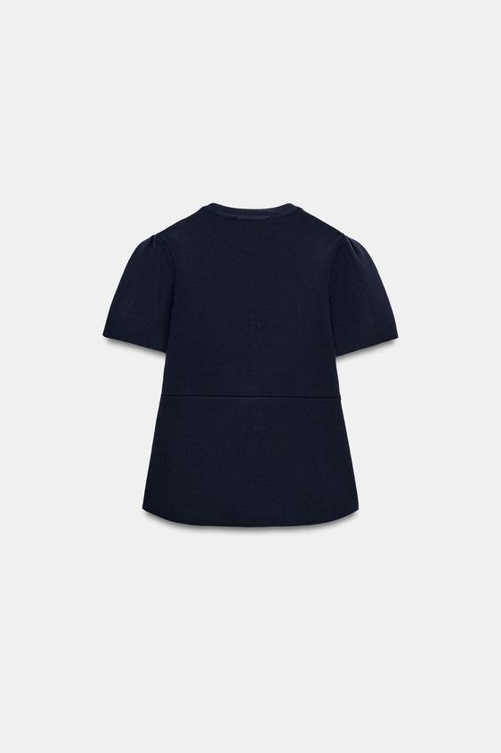 Veste en maille à manches bouffantes à fentes