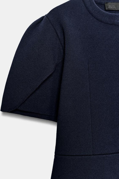 Veste en maille à manches bouffantes à fentes
