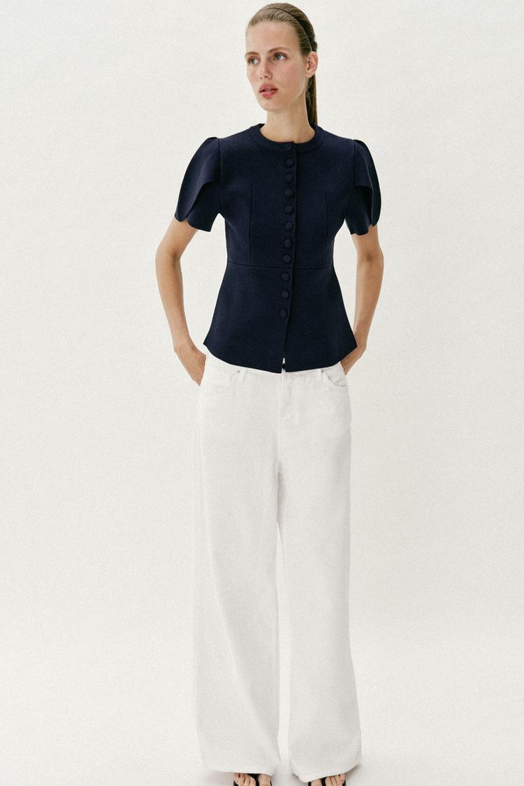 Veste en maille à manches bouffantes à fentes