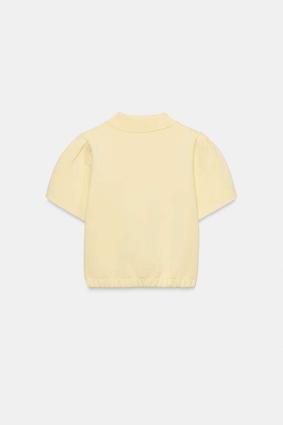 Veste en maille avec nœud
