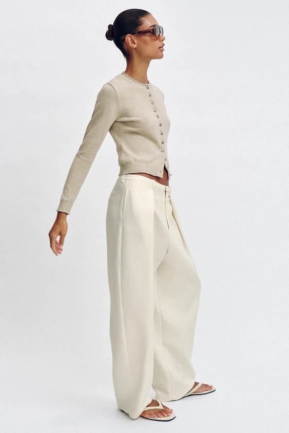Veste en maille à boutons métalliques