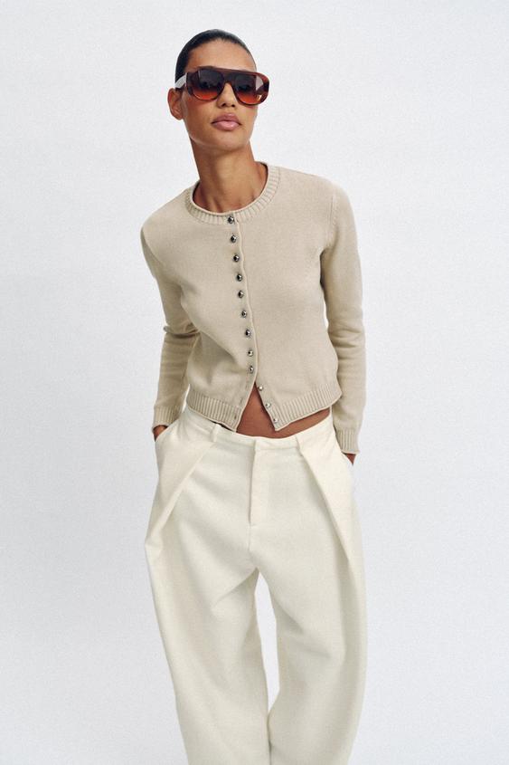 Veste en maille à boutons métalliques