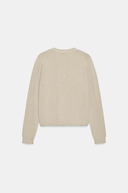 Veste en maille à boutons métalliques