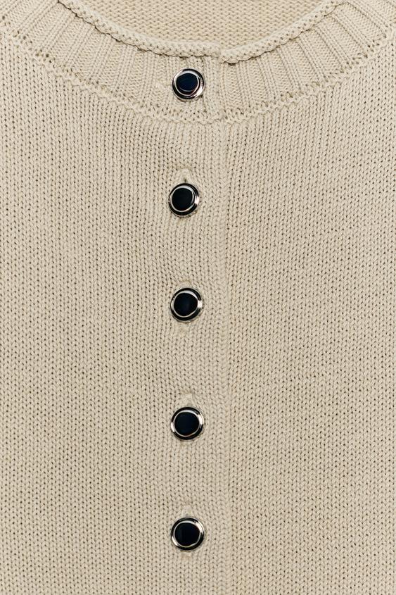 Veste en maille à boutons métalliques
