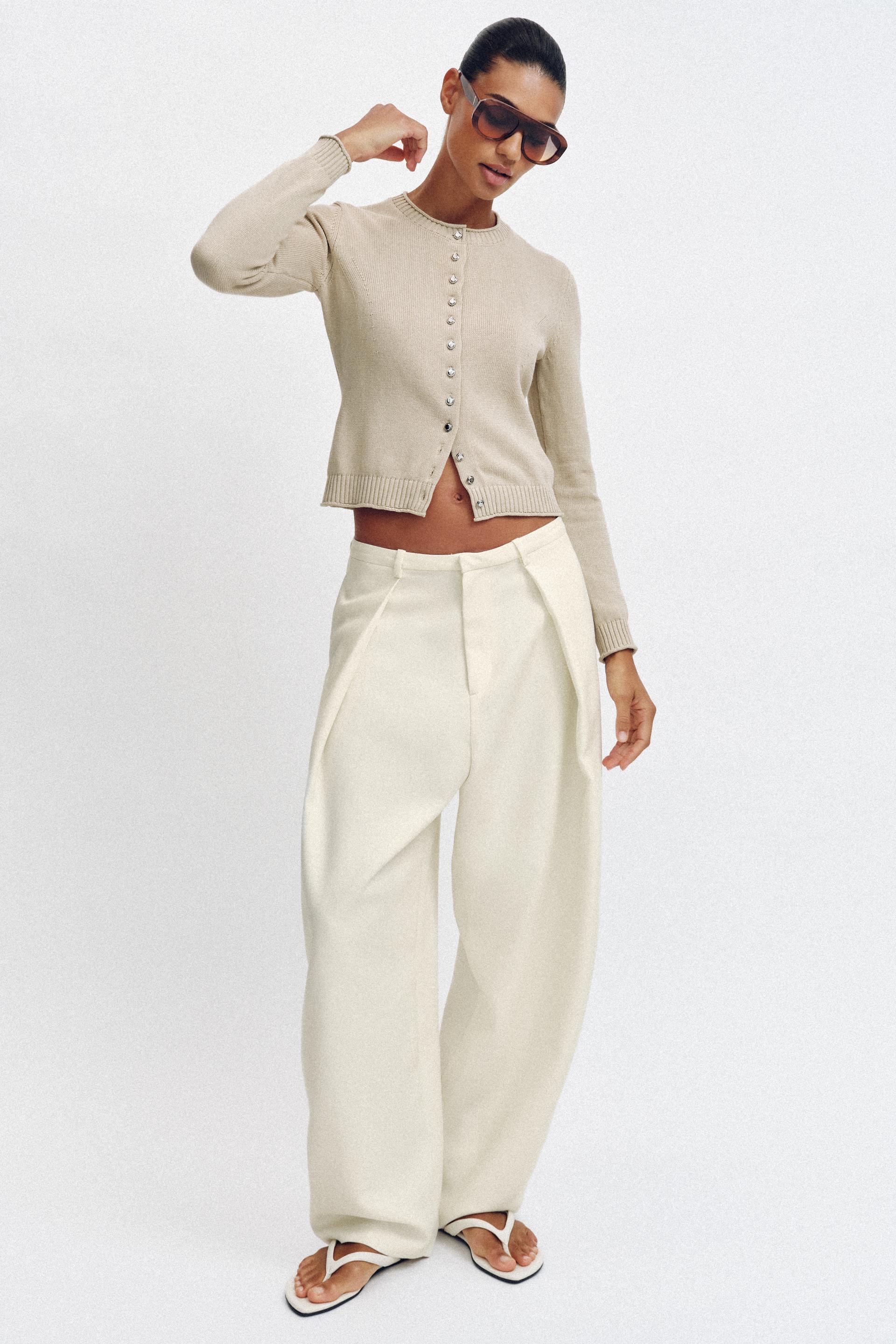 Veste en maille à boutons métalliques