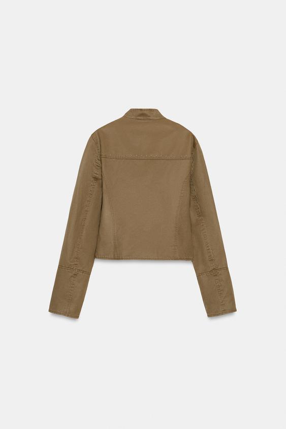 Veste à clous effet délavé