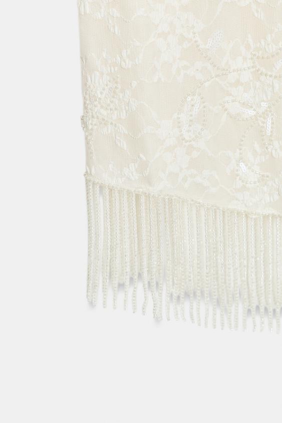 Top en dentelle à perles
