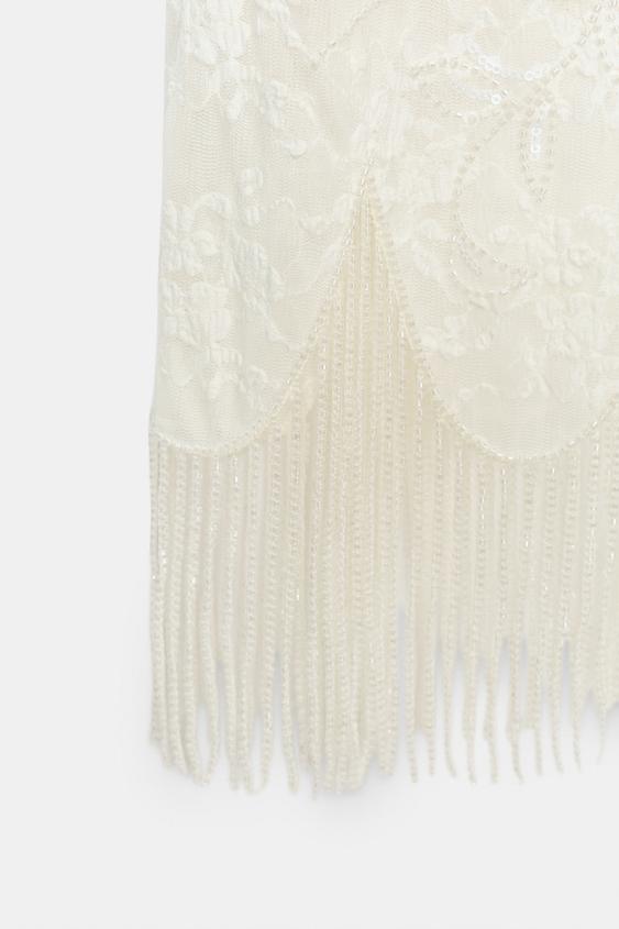 Jupe en dentelle à perles à franges
