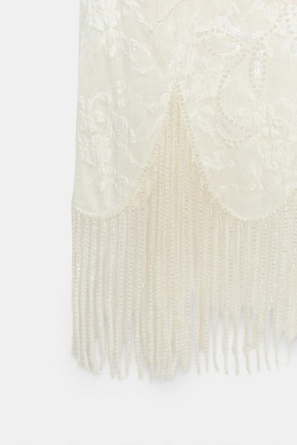 Jupe en dentelle à perles à franges
