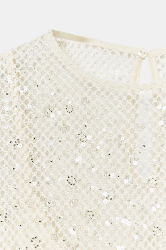 Top rouge à sequins
