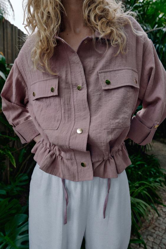 Veste courte à manches retroussées