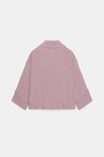 Veste courte à manches retroussées