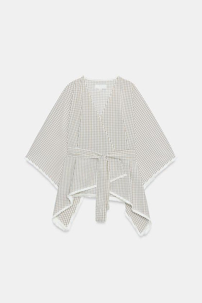 Gilet à carreaux effiloché