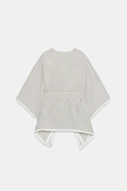 Gilet à carreaux effiloché