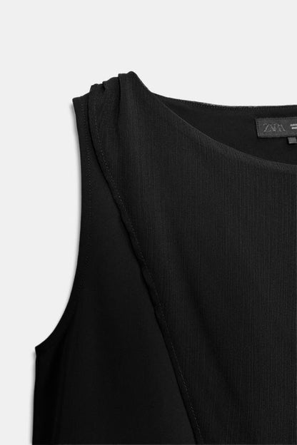 Blouse contrastée effet cape