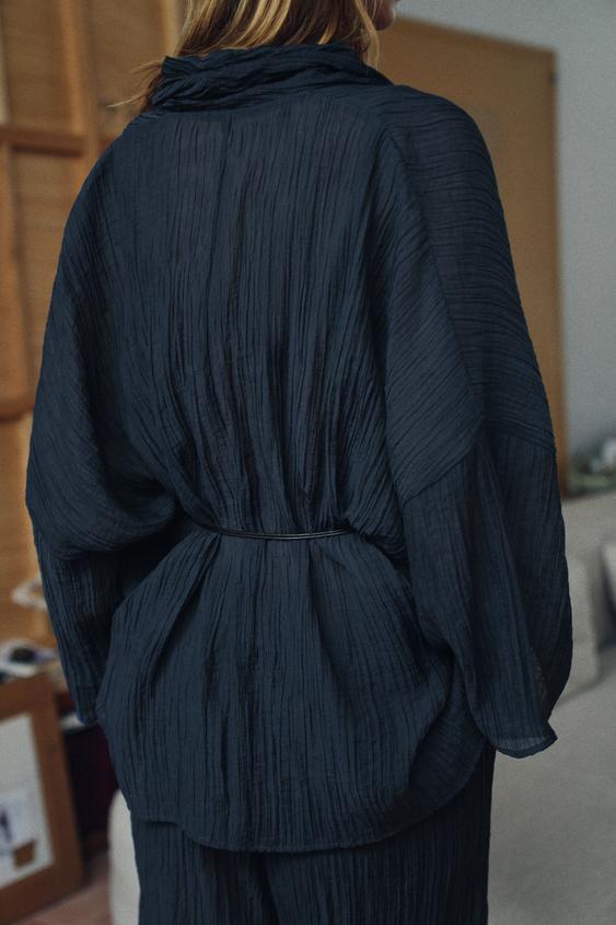 Veste semi-transparente effet froissé