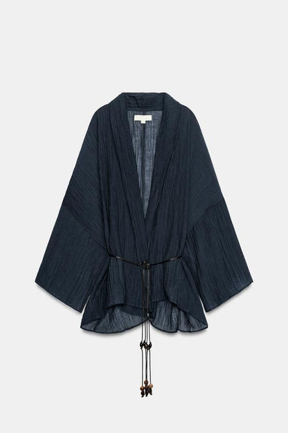 Veste semi-transparente effet froissé