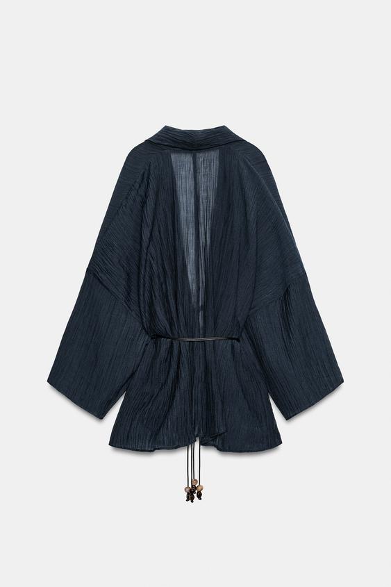 Veste semi-transparente effet froissé