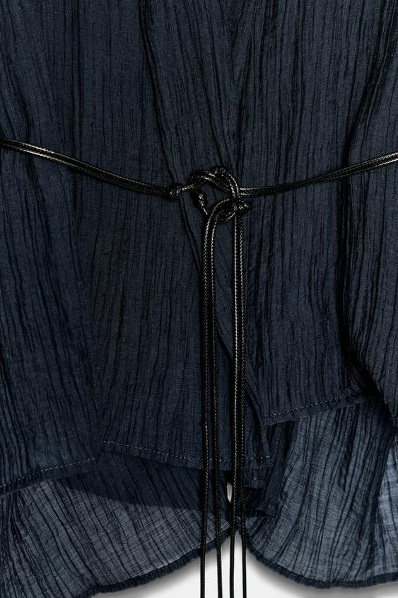 Veste semi-transparente effet froissé