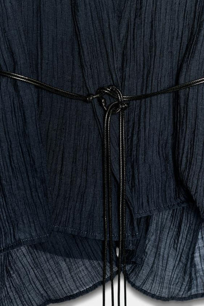 Veste semi-transparente effet froissé