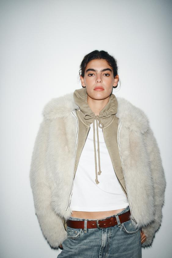 Manteau court effet fourrure à fermeture zippée