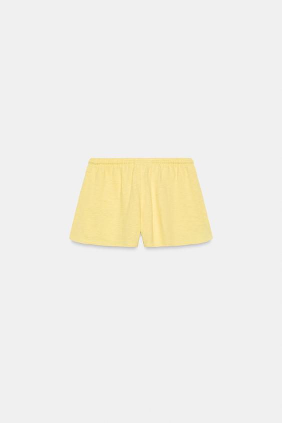 Short en tissu flammé à cordons