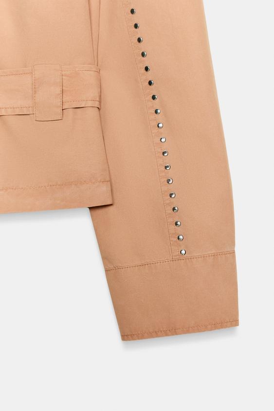 Veste à clous avec ceinture