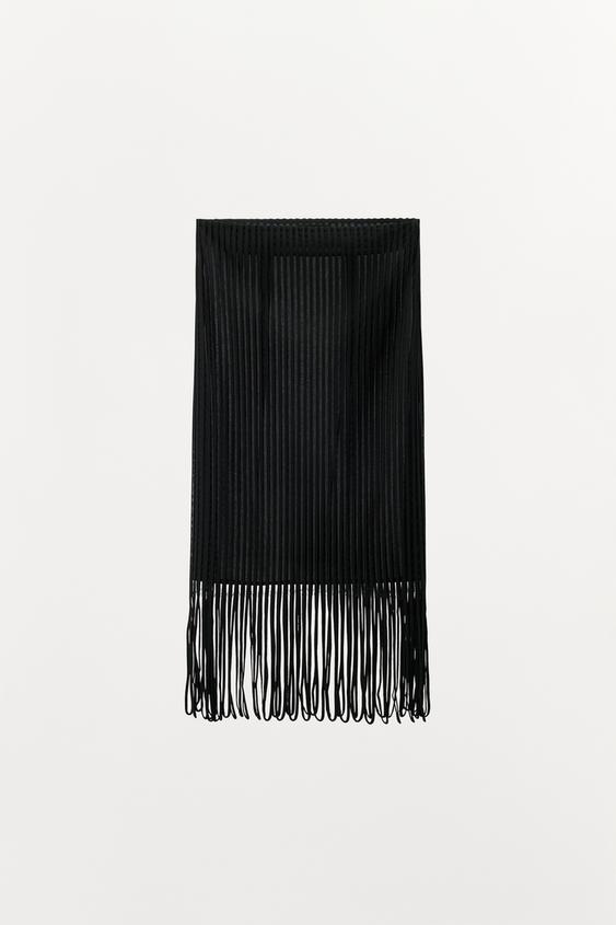 Jupe à lanières et franges
