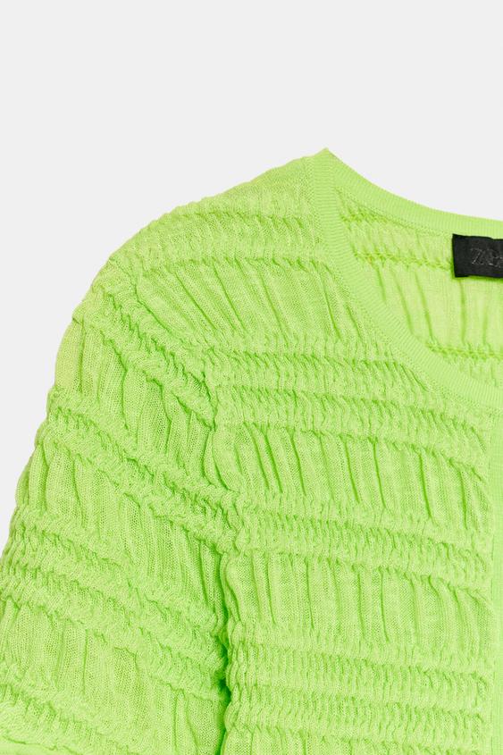 Veste en maille smockée
