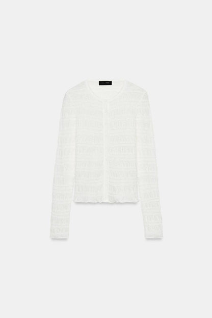 Veste en maille smockée