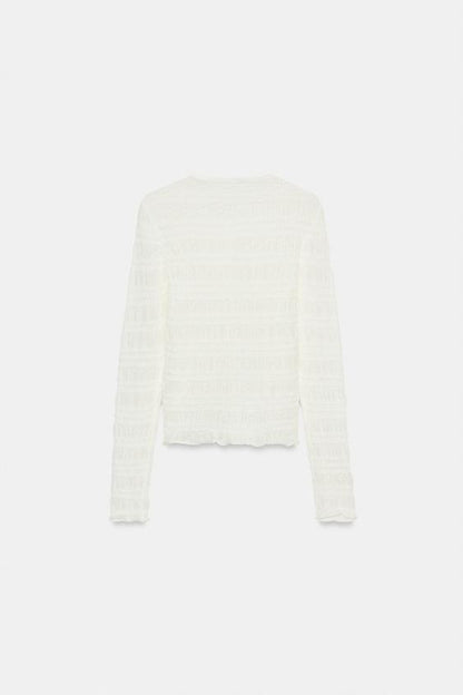 Veste en maille smockée