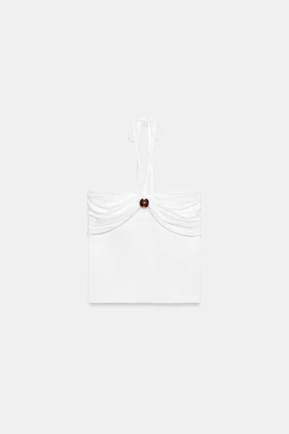 Top bandeau en maille à détail boule