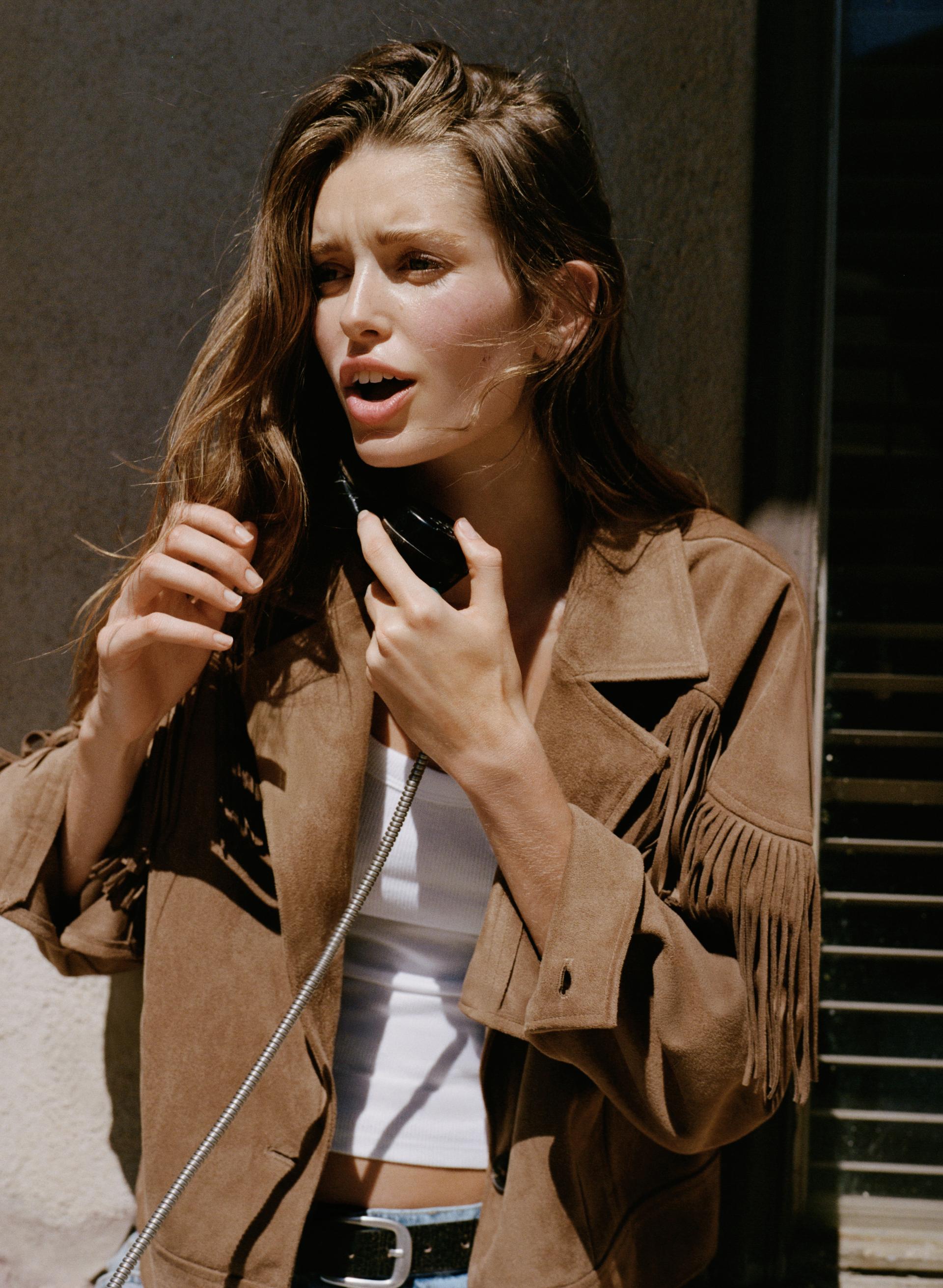 Blouson à franges effet suédine
