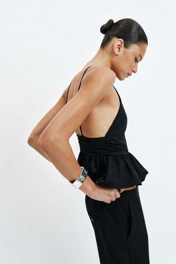 Top dos-nu peplum